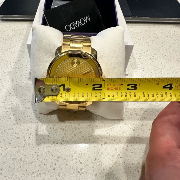 Movado gold and diamond watch. - Picture 9 of 12